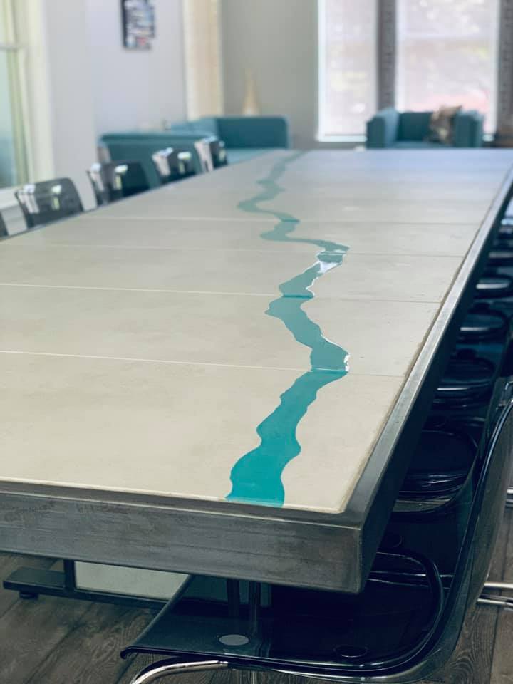 14' concrete and steel dining table with resin river replica in the top